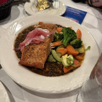 Roger Rocka's Dinner Theater - Seared salmon in a bed of lentil sauce.... - Dinner Theater Near Me - Fresno, California