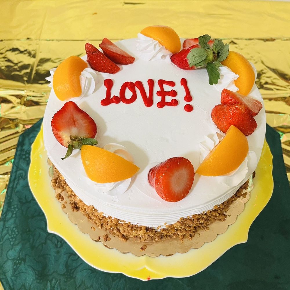 Dulce de Leche Bakery - a cake decorated with fruit - Bakeries Near Me - Jersey City, New Jersey