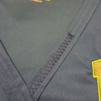 Acorn Uniforms - The manager refused to fix this or refund our money for this ugly defective stitching....terrible service. - Uniforms Near Me - Kent, Washington