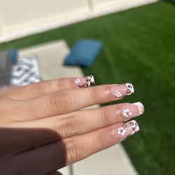 Lilah's Nail Lounge - Acrylic extension with design.