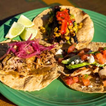 Tortilla Mia - three tacos on a green plate - Mexican Near Me - Carlsbad, California Tortilla Mia - three tacos on a green plate - Mexican Near Me - Carlsbad, California