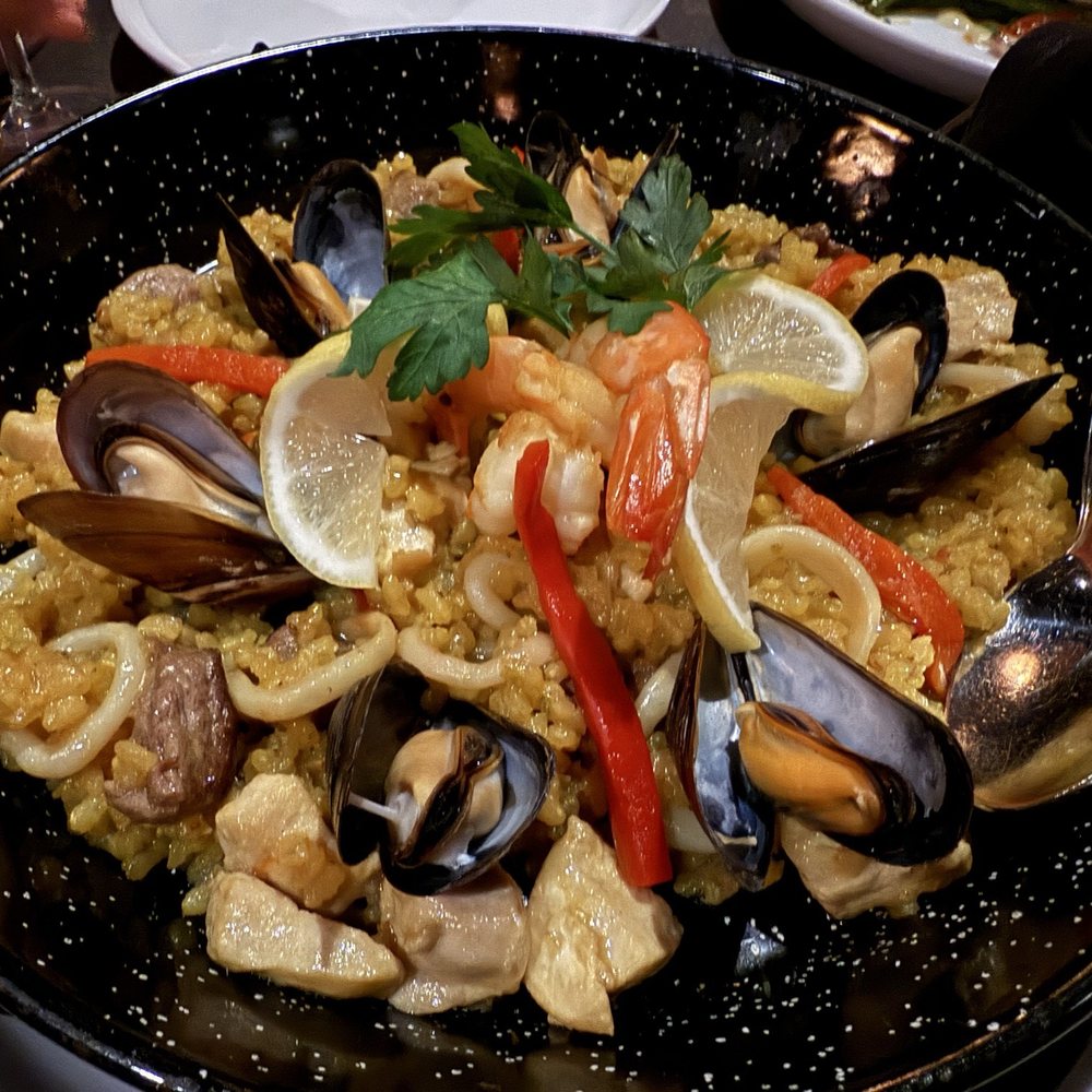 Costa Brava Bistro - Angeles' Paella with Shrimp, Calamari, Mussels, Chicken, Pork & Beef - Spanish Near Me - Bellaire, Texas