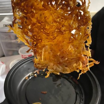 Denny's - a person holding a plate of food - American Near Me - Depew, New York Denny's - a person holding a plate of food - American Near Me - Depew, New York
