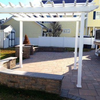 Shull Landscaping - a patio with a pergolated roof - Landscaping Near Me - Ocean View, New Jersey Shull Landscaping - a patio with a pergolated roof - Landscaping Near Me - Ocean View, New Jersey