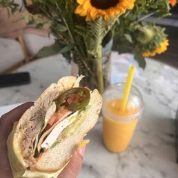 Carnitas torta and mango smoothie Carnitas torta and mango smoothie