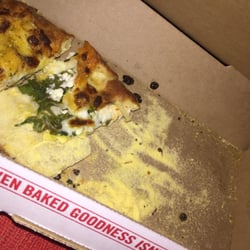 Domino's Pizza - Our pizza and our bread sticks were covered in so much yeast powder it was terrible