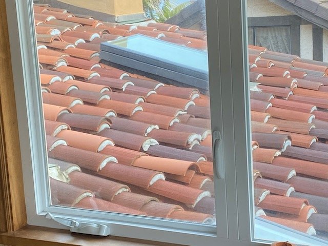 Slide of Dennis Cook Roofing