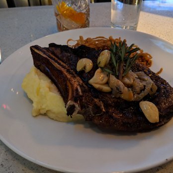Chop Steakhouse & Bar - 20 oz bone in ribeye. I ran hills today so I deserve it ! - Seafood Near Me - Edmonton, Alberta Chop Steakhouse & Bar - 20 oz bone in ribeye. I ran hills today so I deserve it ! - Seafood Near Me - Edmonton, Alberta