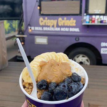 Crispy Grindz - Açaí bowl with granola, bananas, blueberries, peanut butter and coconut added. - Food Trucks Near Me - Honolulu, Hawaii