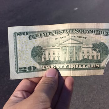 ampm - a hand holding a twenty dollar bill - Convenience Stores Near Me - Atwater, California ampm - a hand holding a twenty dollar bill - Convenience Stores Near Me - Atwater, California