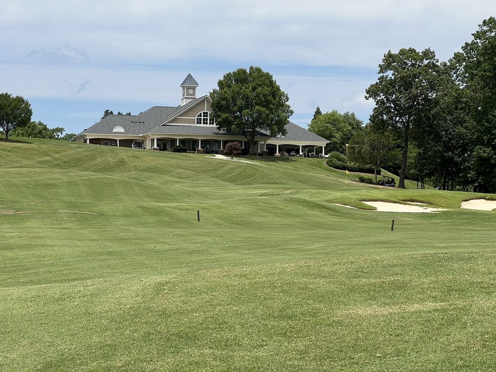 Hole #9 with elevated green guarded by 2 bunkers Yelp