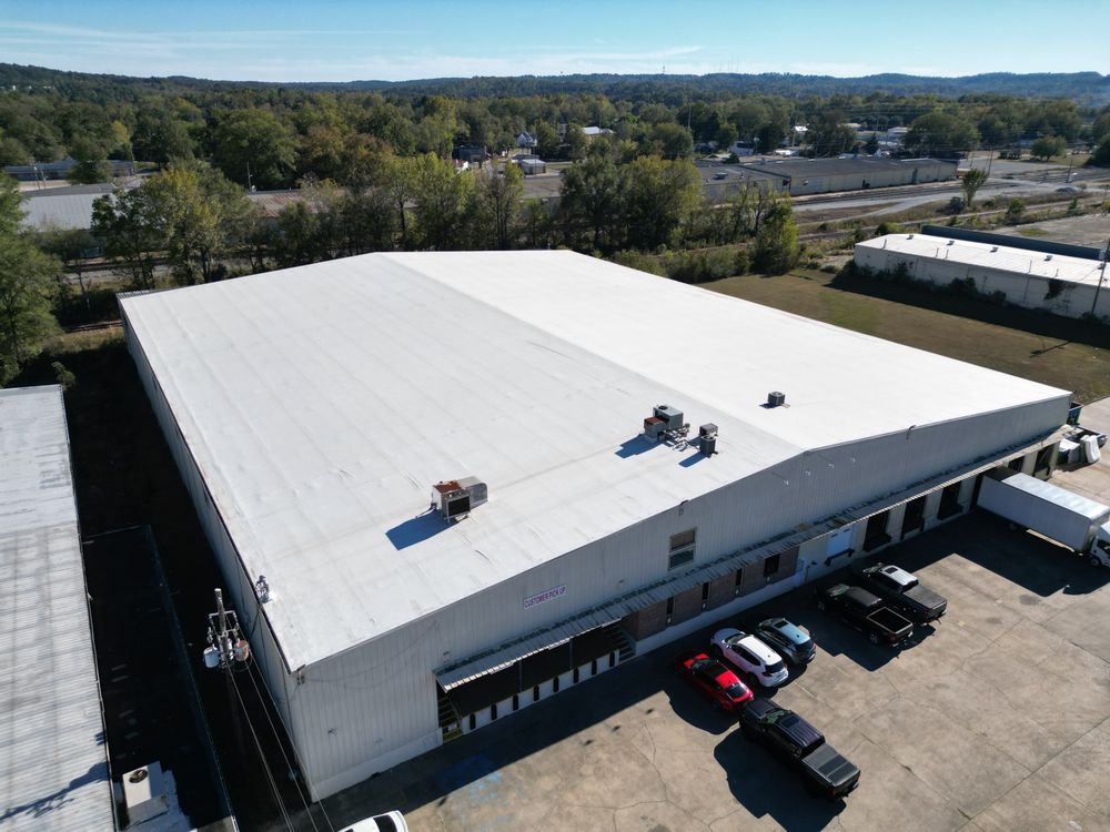 Slide of Norman Roofing