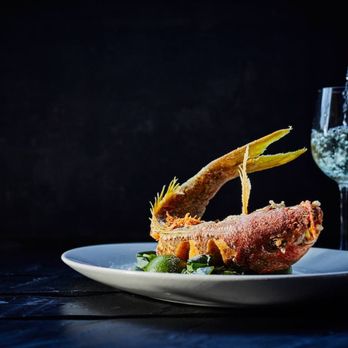 Sway - a plate of food and a glass of wine - Thai Near Me - Aspen, Colorado Sway - a plate of food and a glass of wine - Thai Near Me - Aspen, Colorado