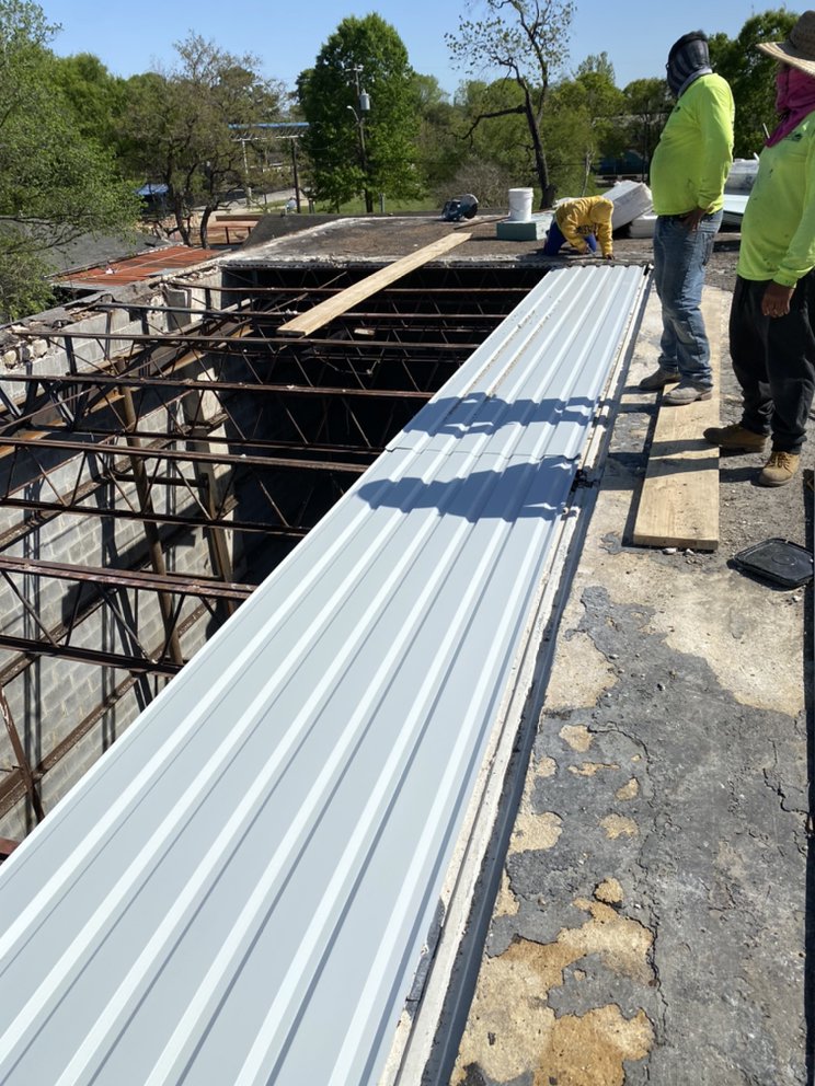 Slide of PNP ROOFING