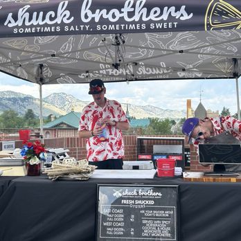 Shuck Brothers - The Shuck Brothers stand outside on north facing roof - Seafood Near Me - Denver, Colorado