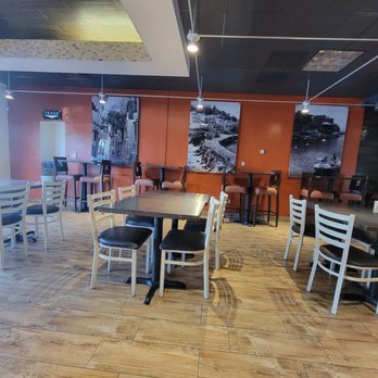 Mika's Greek - a restaurant with tables and chairs - Mediterranean Near Me - Phoenix, Arizona