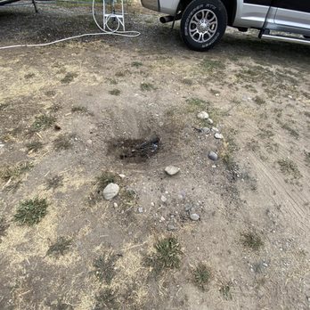 Fireside Buffalo Valley - Fire pit. Be careful. These are all over the place. They are real ankle twisters. - RV Parks Near Me - Moran, Wyoming Fireside Buffalo Valley - Fire pit. Be careful. These are all over the place. They are real ankle twisters. - RV Parks Near Me - Moran, Wyoming