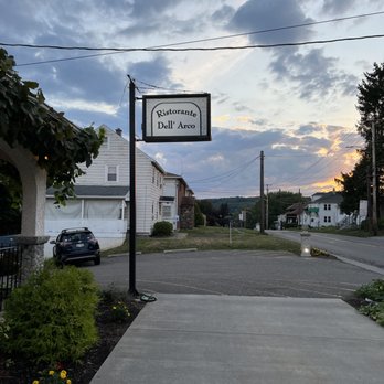 Ristorante Dell'Arco - an empty street with a sign in the foreground - Italian Near Me - Endicott, New York Ristorante Dell'Arco - an empty street with a sign in the foreground - Italian Near Me - Endicott, New York