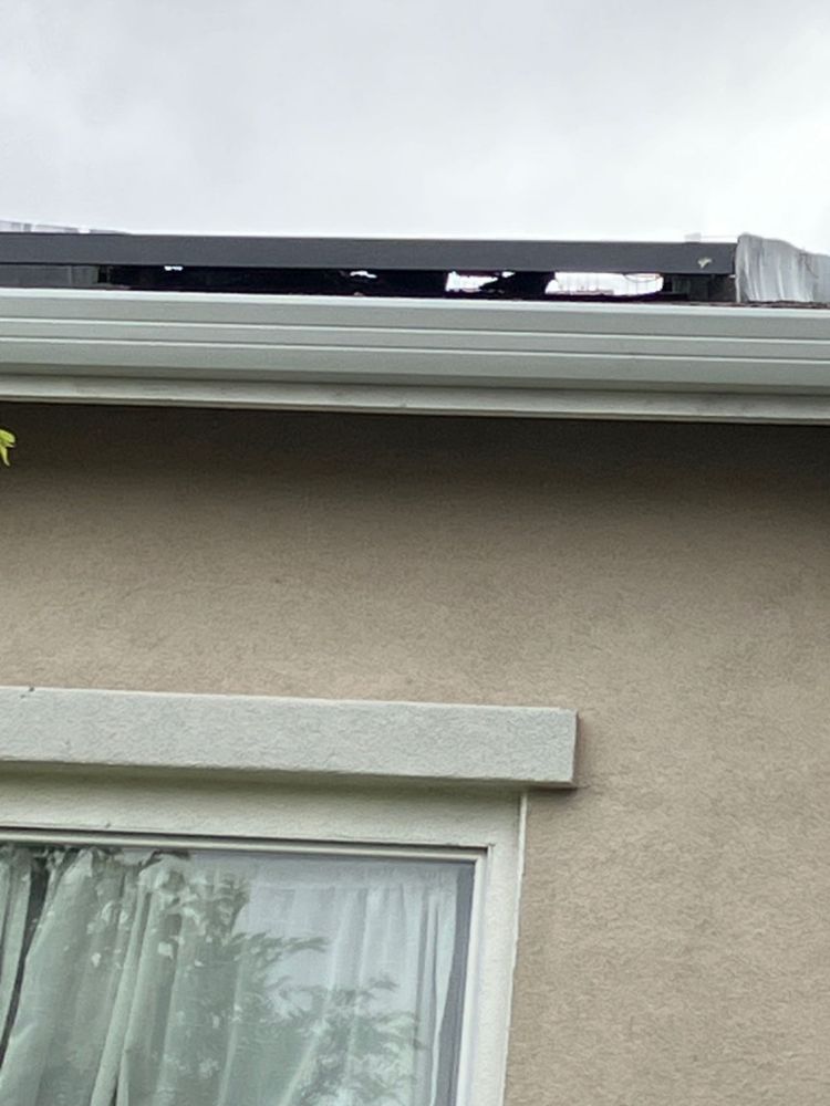 Slide of Crow Minor Roof & Gutter Services