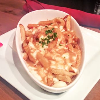 Town Crier Pub - Poutine, got a spice kick to it. Delicious. - Pubs Near Me - Toronto, Ontario Town Crier Pub - Poutine, got a spice kick to it. Delicious. - Pubs Near Me - Toronto, Ontario