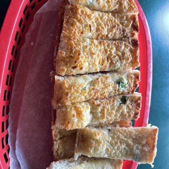 Uricchio's Trattoria - Basil Garlic Cheese Bread - Italian Near Me - Bakersfield, California Uricchio's Trattoria - Basil Garlic Cheese Bread - Italian Near Me - Bakersfield, California