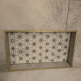 Tru Skill Remodel - a decorative tile in a shower - General Contractors Near Me Tru Skill Remodel - a decorative tile in a shower - General Contractors Near Me