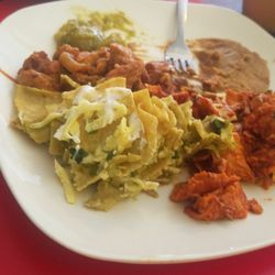 La Carreta - Green/red chilaquiles, beans, bistec chicharrones
