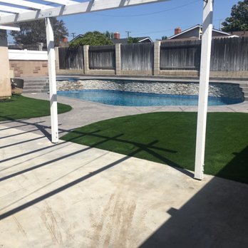 Tropical Breeze Custom Pools - Patio view - Pool & Hot Tub Service Near Me Tropical Breeze Custom Pools - Patio view - Pool & Hot Tub Service Near Me
