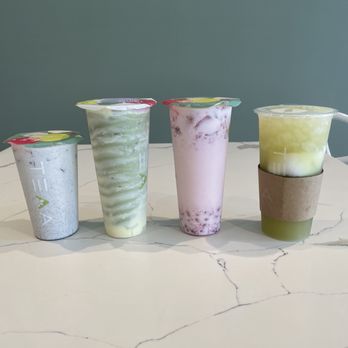 TEAA byme - Left to right: Black sesame milk tea, Matcha brûlée slush, Strawberry milk, Coco cane - Bubble Tea Near Me - Missouri City, Texas TEAA byme - Left to right: Black sesame milk tea, Matcha brûlée slush, Strawberry milk, Coco cane - Bubble Tea Near Me - Missouri City, Texas