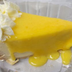 Mellies - New York Cheesecake with Mango topping.