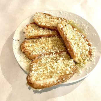 Sandro's Trattoria - Complimentary garlic bread - Italian Near Me - Metairie, Louisiana Sandro's Trattoria - Complimentary garlic bread - Italian Near Me - Metairie, Louisiana