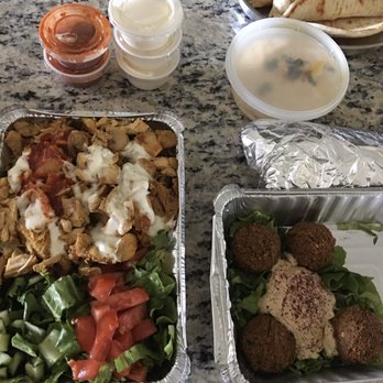 Halal Bros - Chicken over Rice, falafel, Lamb Kebab Wrap(foil wrapped), pita bread,Hummus, red and white sauce. - Middle Eastern Near Me - Austin, Texas