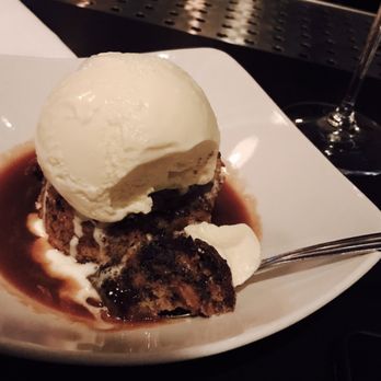 Fishing With Dynamite - Pretzel Chocolate Bread Pudding resting in salted caramel topped with marscapone ice cream - Seafood Near Me - Manhattan Beach, California