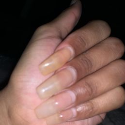 2 weeks after a full set. You can see where they had to cut off the lifted nail and apply more. + the "gel" polish has changed colors. 2 weeks after a full set. You can see where they had to cut off the lifted nail and apply more. + the "gel" polish has changed colors.