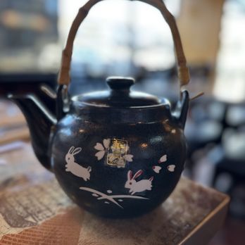 Truly Sichuan - a teapot with a handle on a table - Szechuan Near Me - Ridgewood, New Jersey Truly Sichuan - a teapot with a handle on a table - Szechuan Near Me - Ridgewood, New Jersey