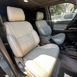 The Prestige Companies Auto Upholstery - 1994 Toyota 4Runner leather upholstery upgrade featuring new seat covers and door panels in "Canvas" Katzkin leather.