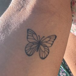 Wild Poppy Tattoo - Butterfly tattoo done by Mike