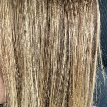 Cheeky Strut - Orange highlights (I asked for cool blonde) - Hair Salons Near Me - Grand Rapids, Michigan