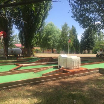 Fort Running Bear R V Park - Mini Golf Course, hole 6 at Fort Running Bear RV Park. Playing straight through the White House!! - RV Parks Near Me - Mountain Home, Idaho Fort Running Bear R V Park - Mini Golf Course, hole 6 at Fort Running Bear RV Park. Playing straight through the White House!! - RV Parks Near Me - Mountain Home, Idaho