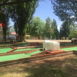 Fort Running Bear R V Park - Mini Golf Course, hole 6 at Fort Running Bear RV Park. Playing straight through the White House!!