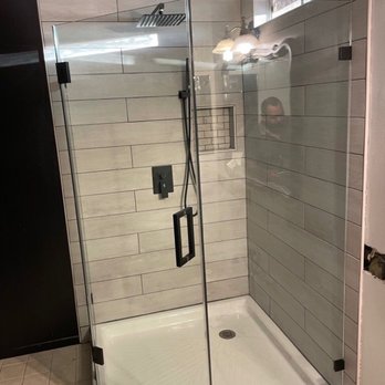 Jaa Remodeling & Construction - My daughter's beautiful shower with a clear glass enclosure. - Handyman Near Me