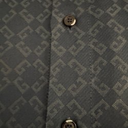 Super Wash - Damaged buttons on a men's shirt