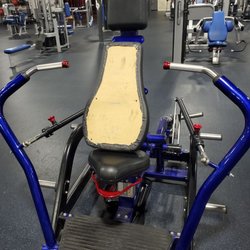 Crunch Fitness - Clarksville - Chest press machine, seat is torn off.