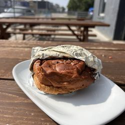 Queen City Collective Coffee - Sausage egg and cheese w a green chili aioli