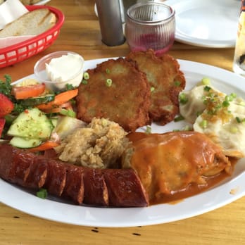 Polish Bistro - Polish plate with potato pancakes, sausage, pierogis and stuffed cabbage - Polish Near Me - Chicago, Illinois