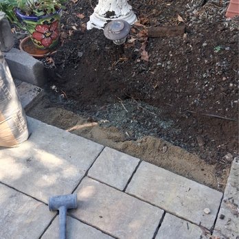 System Pavers - Reinstalling the pavers and pouring sand in between the pavers. - Landscaping Near Me - Vallejo, California