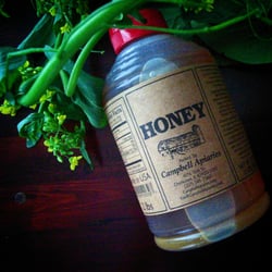 Market at the Square - Local wildflower honey (clover also available) & greens make me happy.