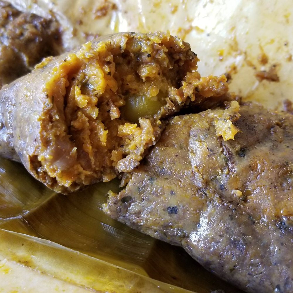 La Isla - Pasteles filling. So much meat and filling. - Latin American Near Me - Brooklyn, New York La Isla - Pasteles filling. So much meat and filling. - Latin American Near Me - Brooklyn, New York
