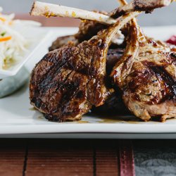 Nan Thai Fine Dining - Thai-Style BBQ lamb chops with green papaya salad and sticky rice