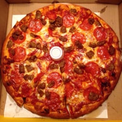 Mozzeroni's Pizza & Pasta - Medium thick-crust, extra sauce, pepperoni and sausage.